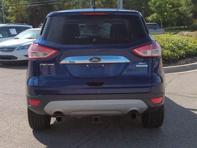 Photo of 2013 Deep Impact Blue Ford Escape
