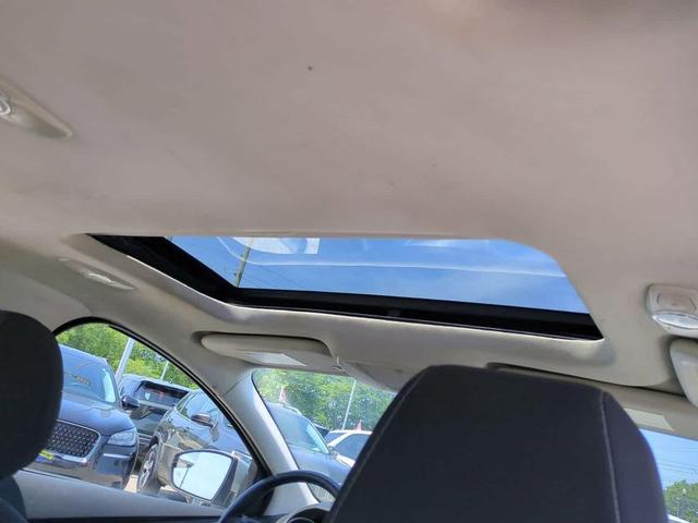 Photo of 2014 Ingot Silver Metallic Ford Focus