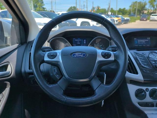 Photo of 2014 Ingot Silver Metallic Ford Focus