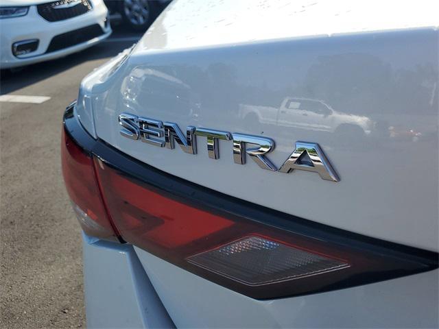 Photo of 2023 Aspen White Tricoat Nissan Sentra