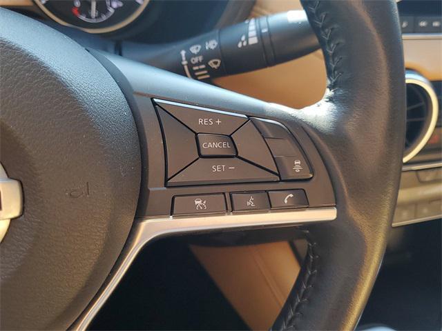 Photo of 2023 Aspen White Tricoat Nissan Sentra