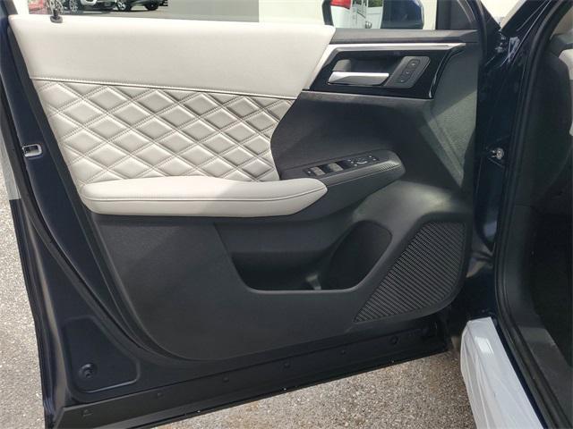 Photo of 2025 Cosmic Blue Metallic Mitsubishi Outlander PHEV