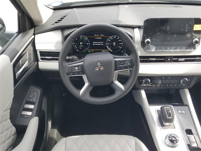 Photo of 2025 Cosmic Blue Metallic Mitsubishi Outlander PHEV