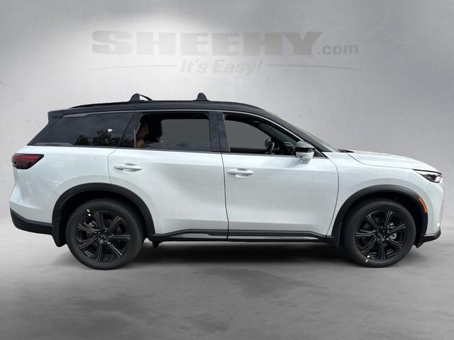 Photo of 2026 Radiant White/Black Obsidian INFINITI QX60