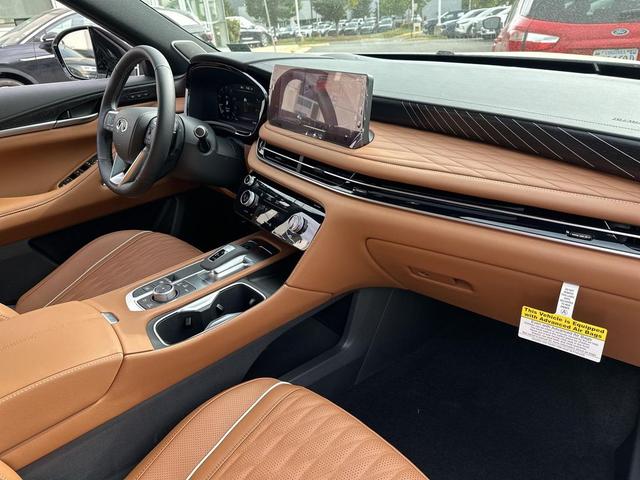 Photo of 2026 Radiant White/Black Obsidian INFINITI QX60