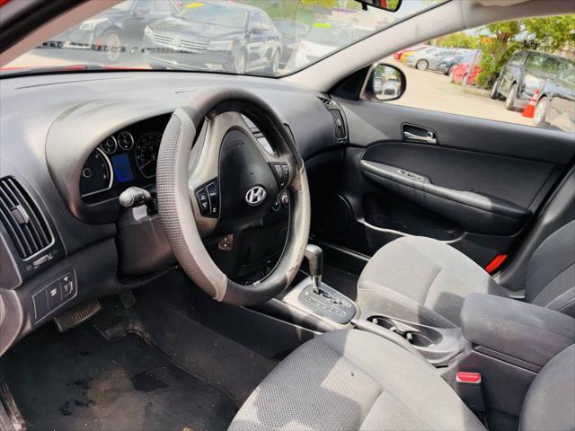 Photo of 2010 Chilipepper Red Hyundai Elantra Touring