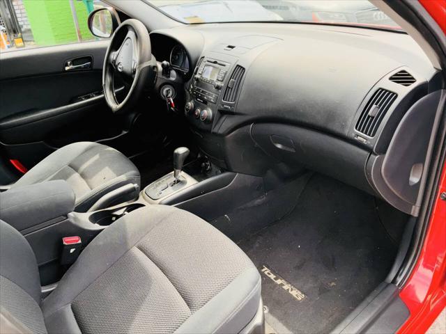 Photo of 2010 Chilipepper Red Hyundai Elantra Touring