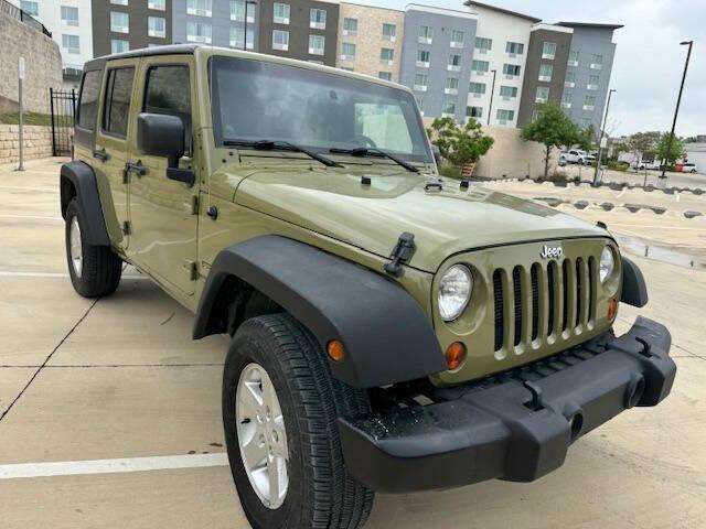 Photo of 2013 Green Jeep Wrangler Unlimited