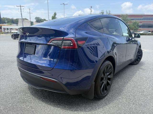 Photo of 2023 Deep Blue Metallic Tesla Model Y
