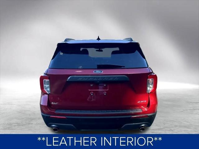 Photo of 2024 Rapid Red Metallic Tinted Clearcoat Ford Explorer