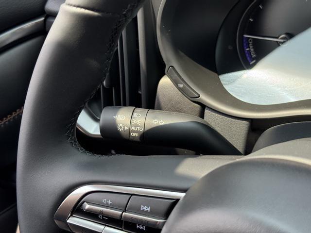 Photo of 2025 Jet Black Mazda CX-50 Hybrid
