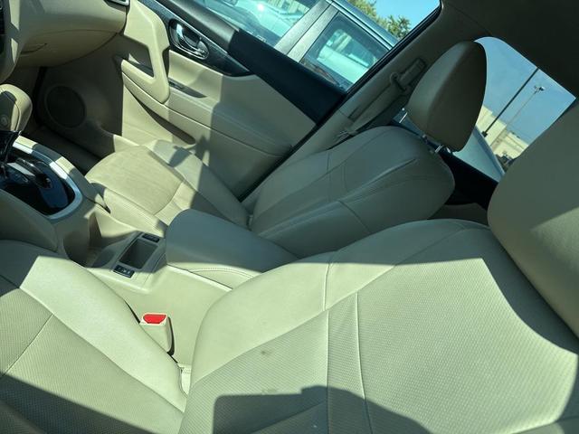 Photo of 2015 Cayenne Red Nissan Rogue