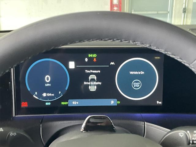 Photo of 2025 Hampton Gray Hyundai SANTA FE HEV