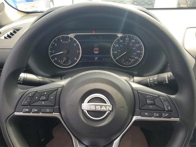 Photo of 2025 Aspen White Tricoat Nissan Sentra