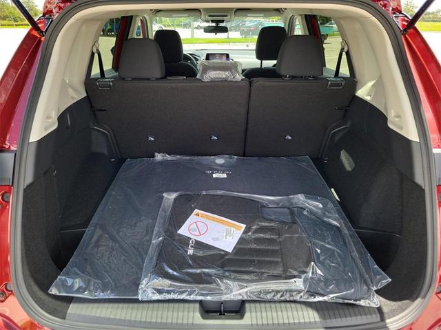 Photo of 2026 Scarlet Ember Tintcoat Nissan Rogue
