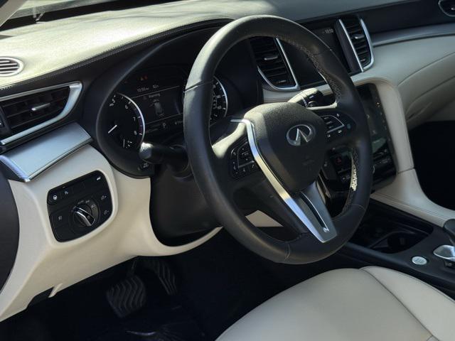 Photo of 2021 Majestic White INFINITI QX50