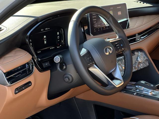 Photo of 2025 Majestic White/Black Obsidian INFINITI QX60