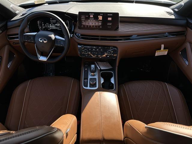 Photo of 2025 Majestic White/Black Obsidian INFINITI QX60
