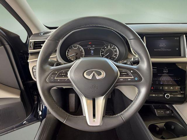Photo of 2024 Hermosa Blue INFINITI QX50