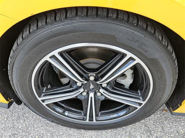 Photo of 2024 Yellow Ford Mustang