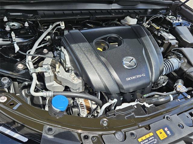 Photo of 2024 Jet Black Mazda CX-50
