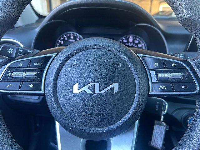 Photo of 2023 Fire Orange Kia Forte