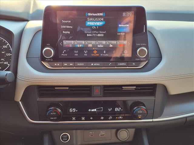 Photo of 2023 Pearl White Tricoat Nissan Rogue