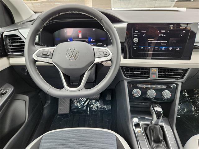 Photo of 2025 Deep Black Pearl Volkswagen Taos