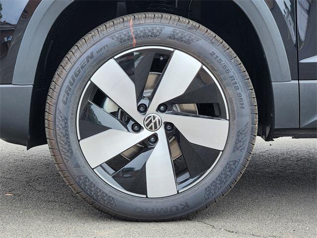 Photo of 2025 Deep Black Pearl Volkswagen Taos