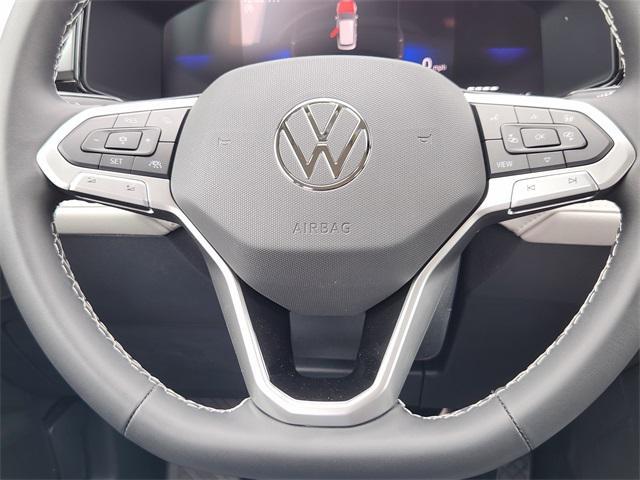Photo of 2025 Deep Black Pearl Volkswagen Taos