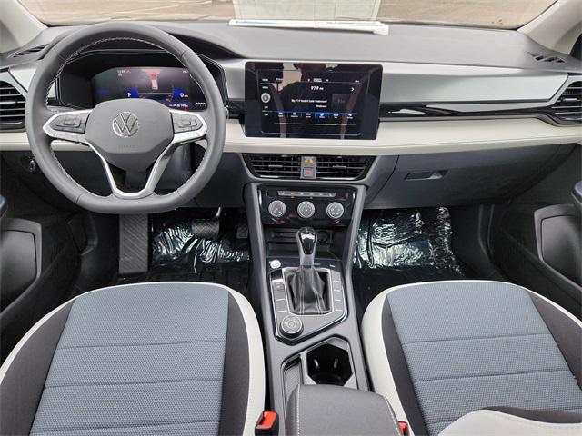 Photo of 2025 Deep Black Pearl Volkswagen Taos