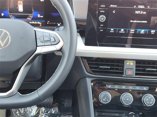 Photo of 2025 Monterey Blue Pearl Volkswagen Taos