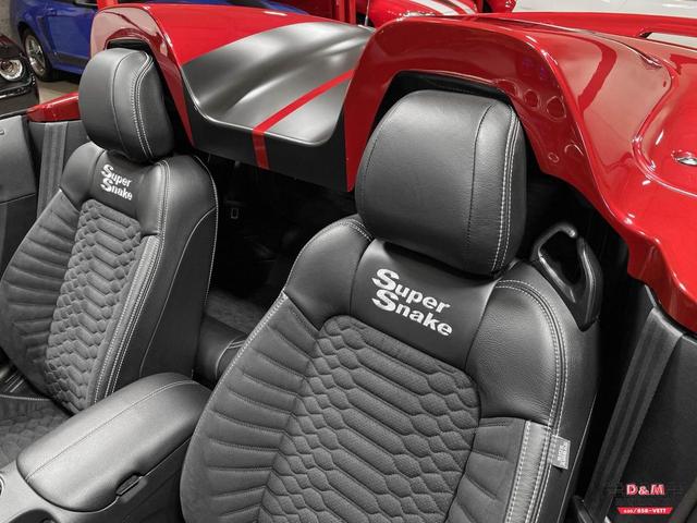 Photo of 2021 Rapid Red Metallic Tinted Clearcoat Ford Mustang