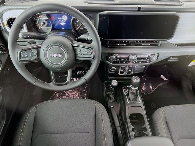 Photo of 2025 Granite Crystal Metallic Clearcoat Jeep Wrangler