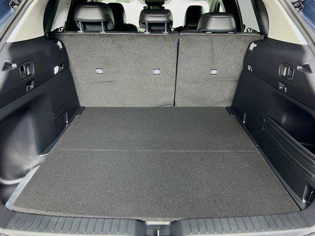 Photo of 2025 Ingot Blue Metallic Mazda CX-50 Hybrid