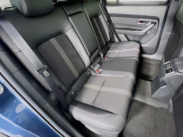 Photo of 2025 Ingot Blue Metallic Mazda CX-50 Hybrid