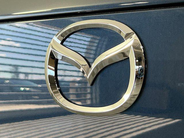 Photo of 2025 Ingot Blue Metallic Mazda CX-50 Hybrid