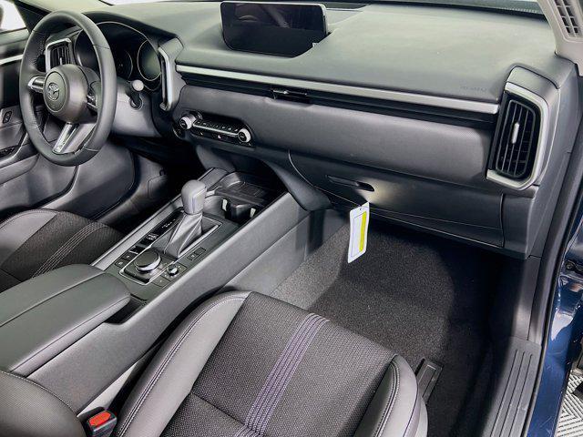 Photo of 2025 Ingot Blue Metallic Mazda CX-50 Hybrid
