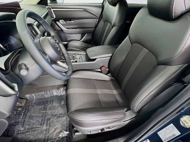Photo of 2025 Ingot Blue Metallic Mazda CX-50 Hybrid