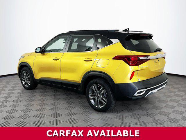 Photo of 2023 Starbright Yellow/Black Roof Kia Seltos
