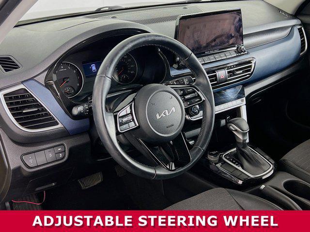 Photo of 2023 Starbright Yellow/Black Roof Kia Seltos