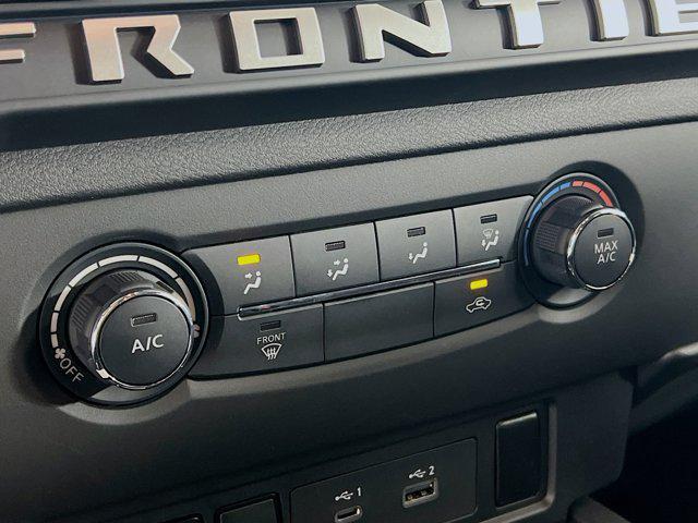 Photo of 2026 Tactical Green Metallic Nissan Frontier