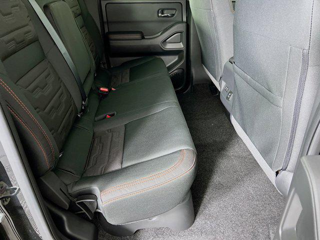 Photo of 2025 Super Black Nissan Frontier