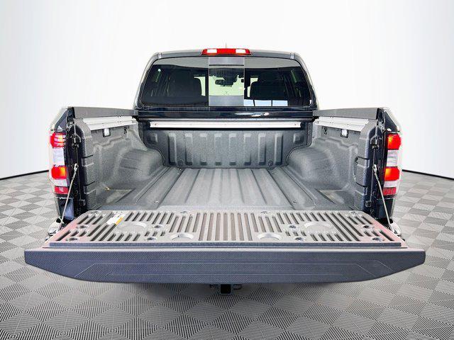 Photo of 2025 Super Black Nissan Frontier