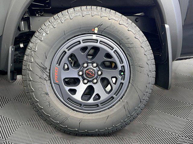 Photo of 2025 Super Black Nissan Frontier