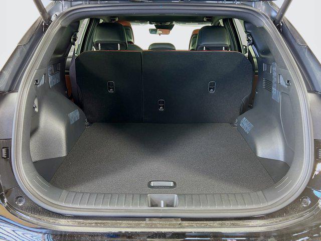 Photo of 2025 Fusion Black Kia Sportage Hybrid