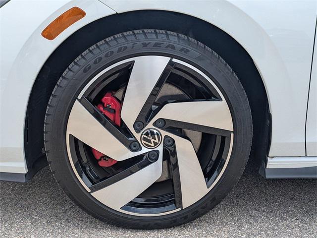 Photo of 2023 Opal White Pearl Volkswagen Golf GTI