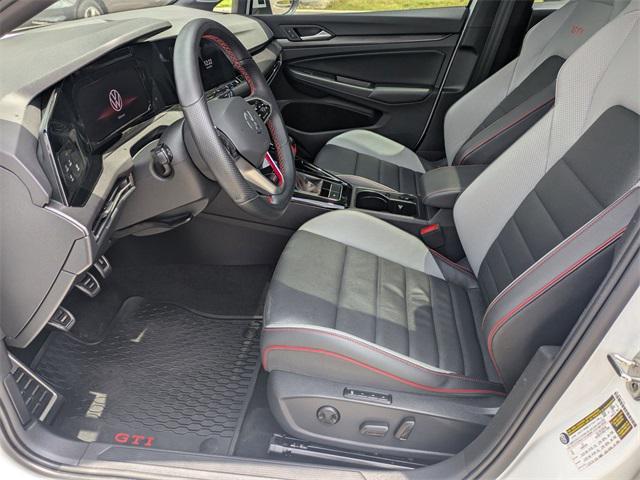 Photo of 2023 Opal White Pearl Volkswagen Golf GTI