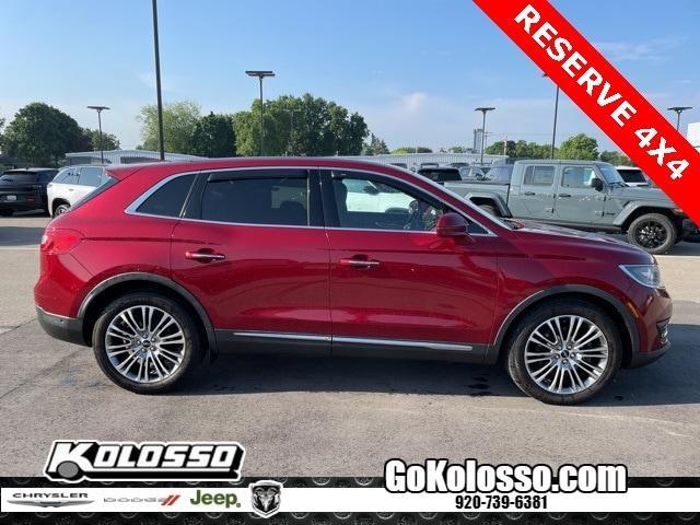 Photo of 2016 Ruby Red Metallic Lincoln MKX