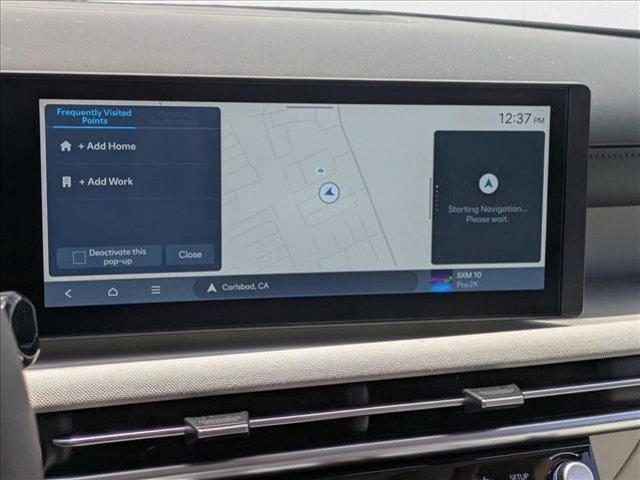Photo of 2025 Titan Gray Hyundai TUCSON Hybrid